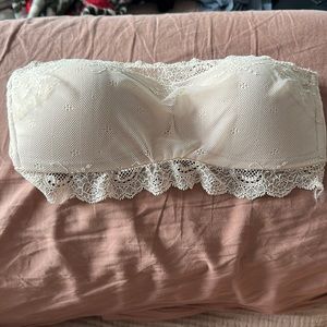 Spanx bandeau. Brand new. Nude colored. Slip on and skip off, no hooks! Padded.